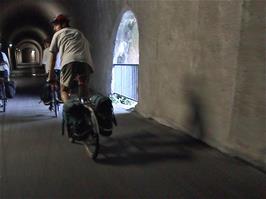 The Weisswand Cycle Tunnel, offering windows to Lake Walen on the right and the highway on the left, 40.9 miles into the ride